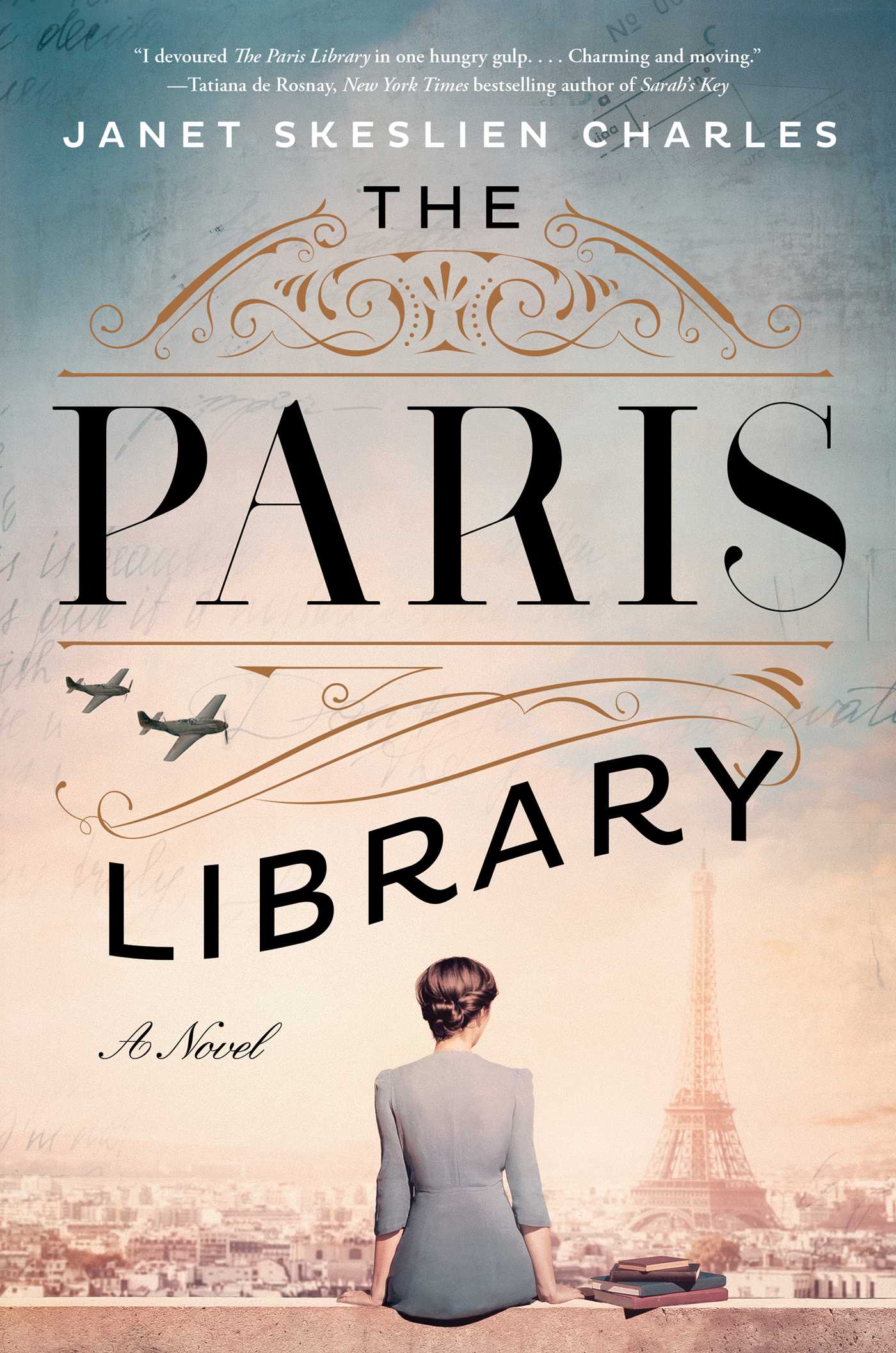 Shows a woman sitting on the edge of a rooftop overlooking the skyline of Paris. The Eiffel Tower is faded in the background.
